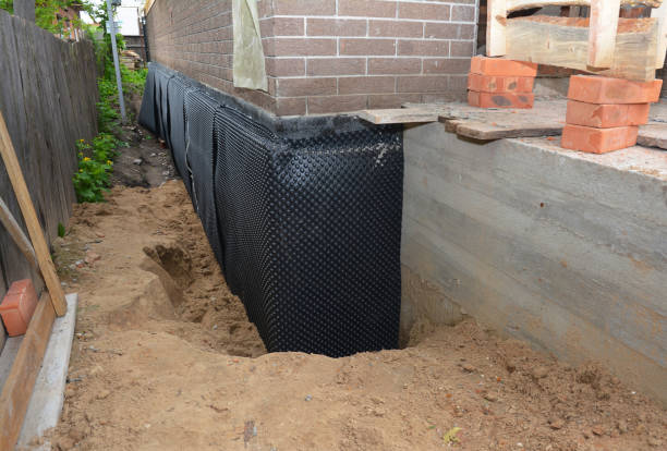 Happy homeowners after waterproofing job in Kingsport